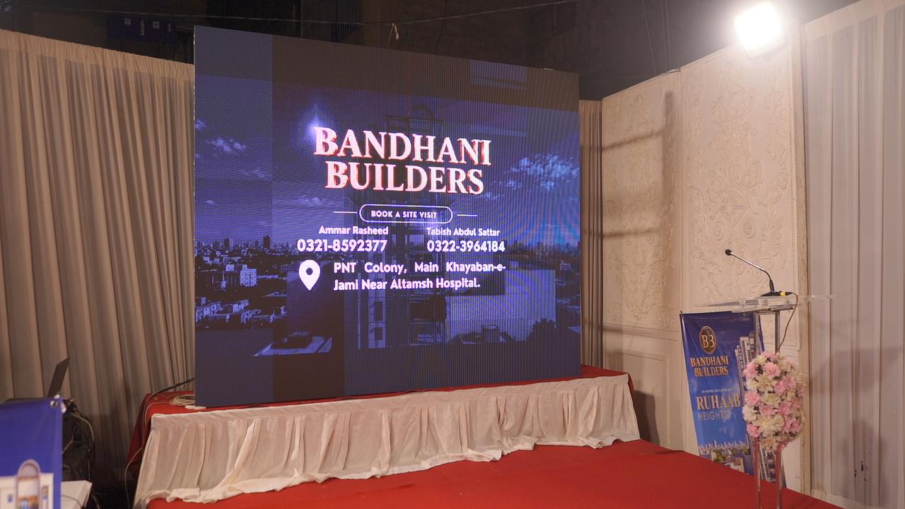 LED screen inviting guests to book a site visit